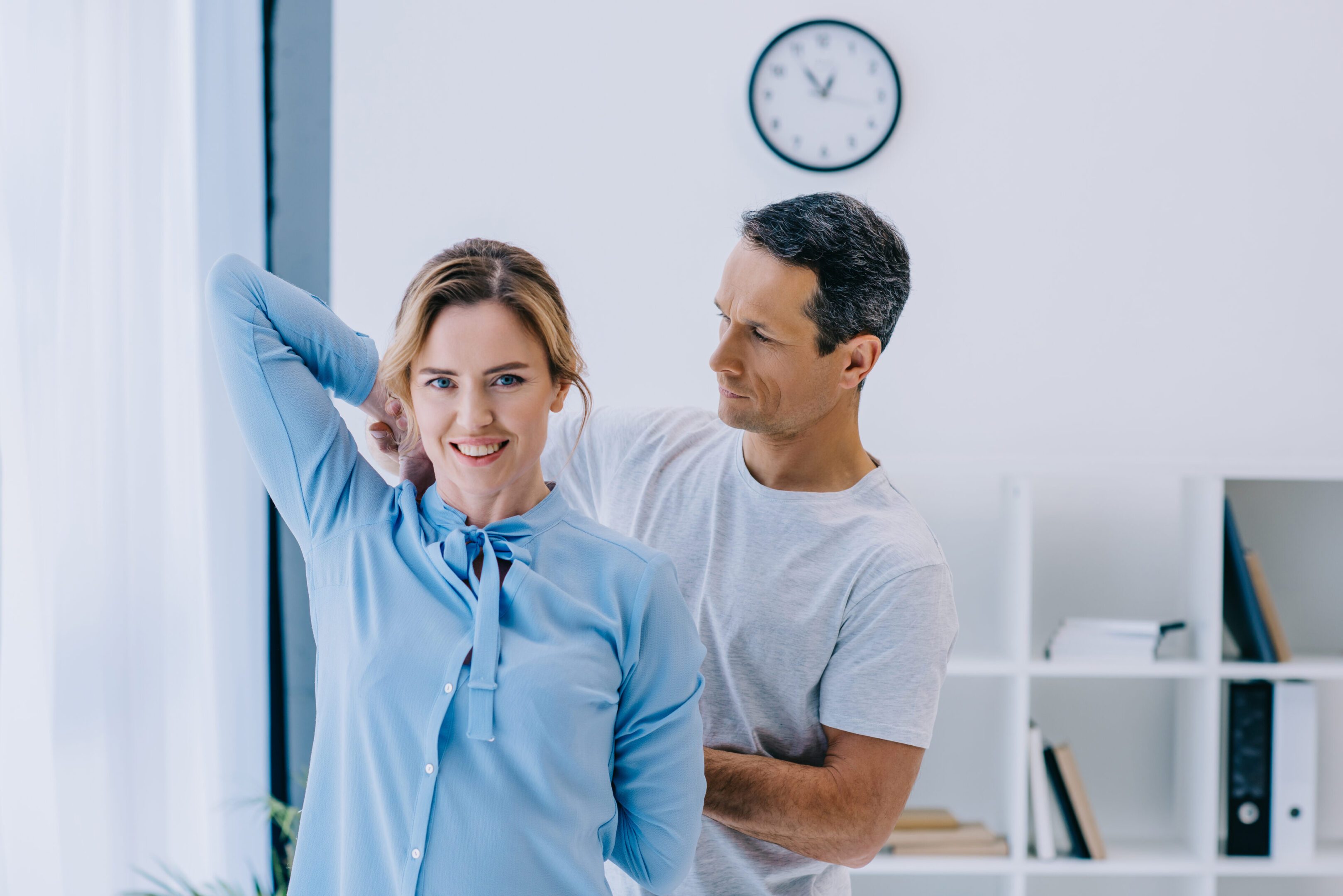 Woman receiving physical therapy in clinic.