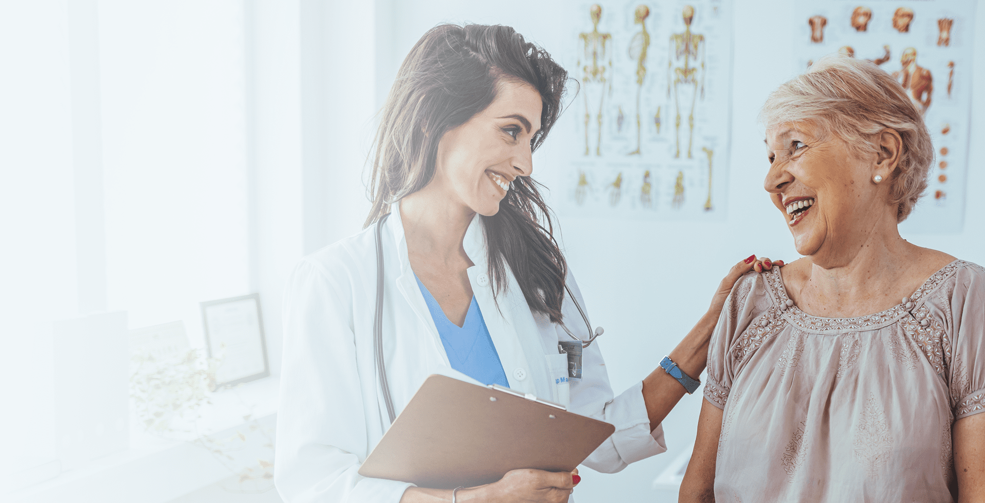 Doctor and patient smiling during consultation.